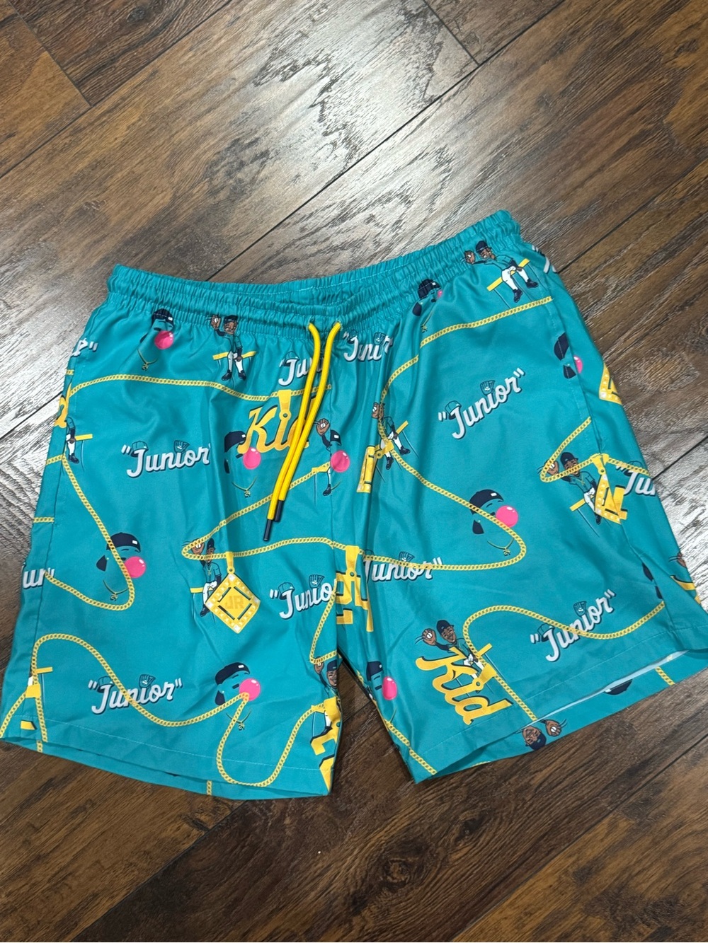 Teal Men’s Baseballism Graphic Swim Shorts with Yellow Accents